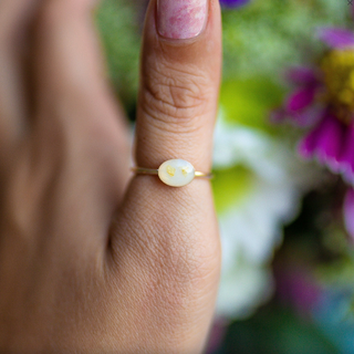 breast milk ring with shimmer and flowers